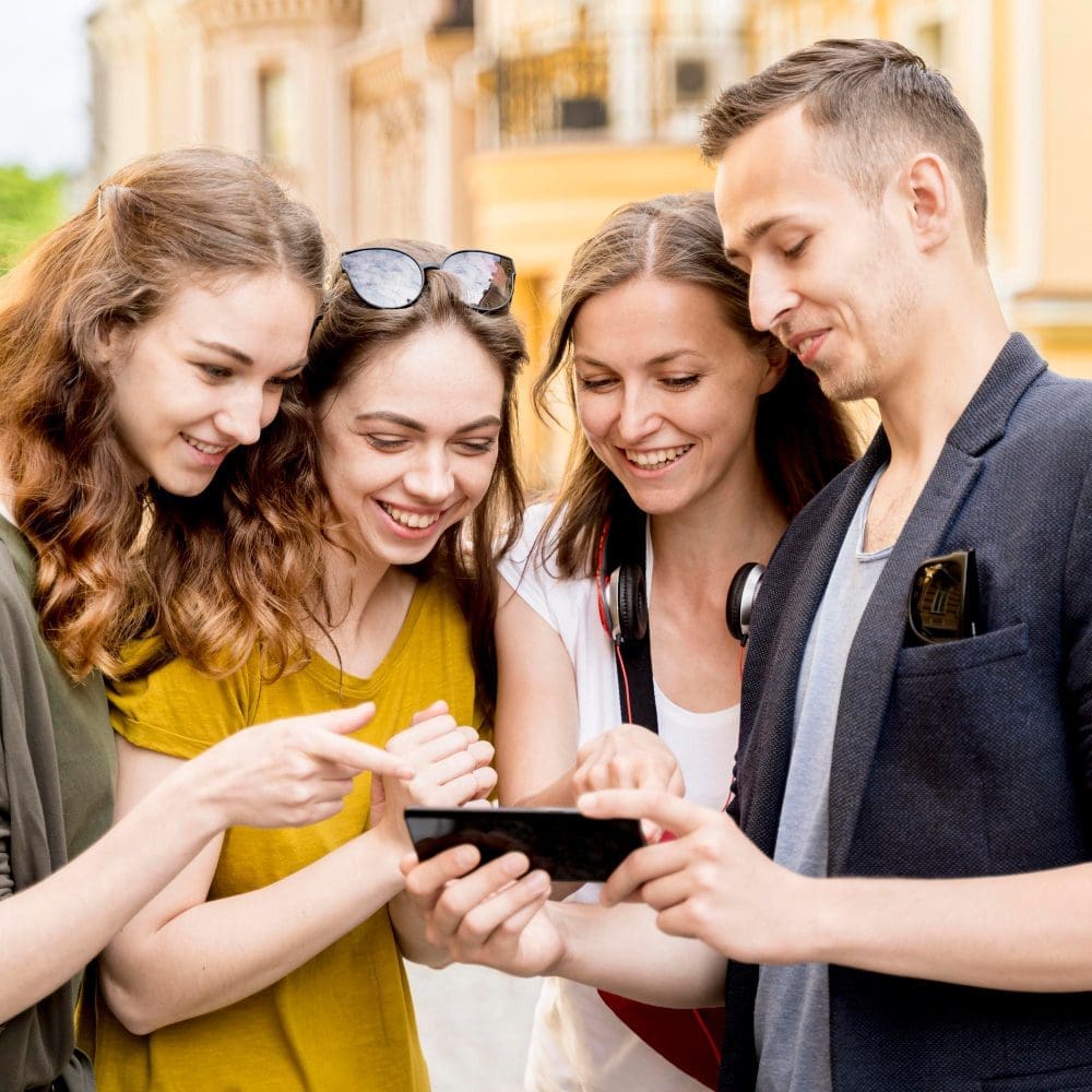 Group of friends, cell phone.