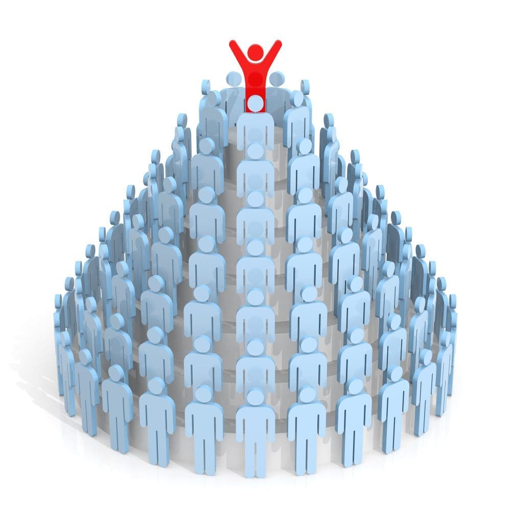 A team utilizing local search engine optimization techniques stands atop a pyramid.
