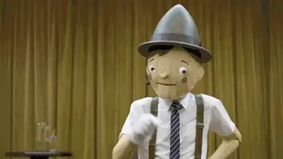 A mascot representing digital transformation wears a hat and suspenders.